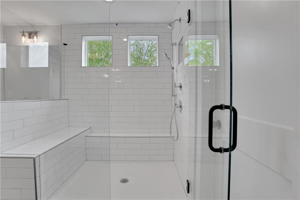 508 Pine Bough Road Ball Ground, GA 30107 - Photo 36 of 47 a bathroom with a shower