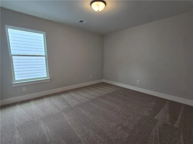 an empty room with an entryway
