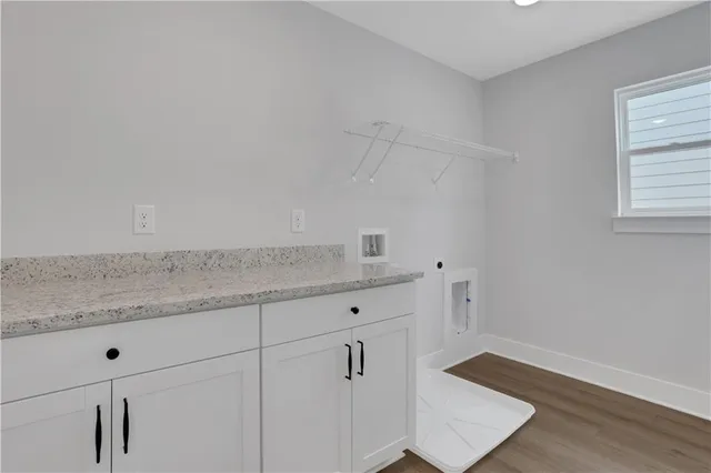 a bathroom with a shower sink and mirror