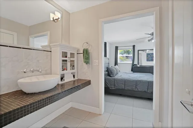 a living room with furniture and a bathtub