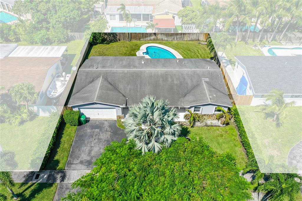 8101 Southwest 198th Street Cutler Bay, FL 33189 - Photo 16 of 16 a view of swimming pool with a yard