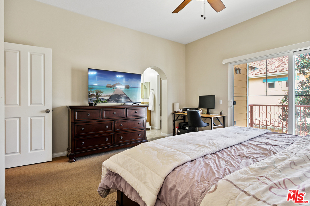 4153 Paredo Way, Unit A Simi Valley, CA 93063 - Photo 16 of 33 a bedroom with a bed and a dresser