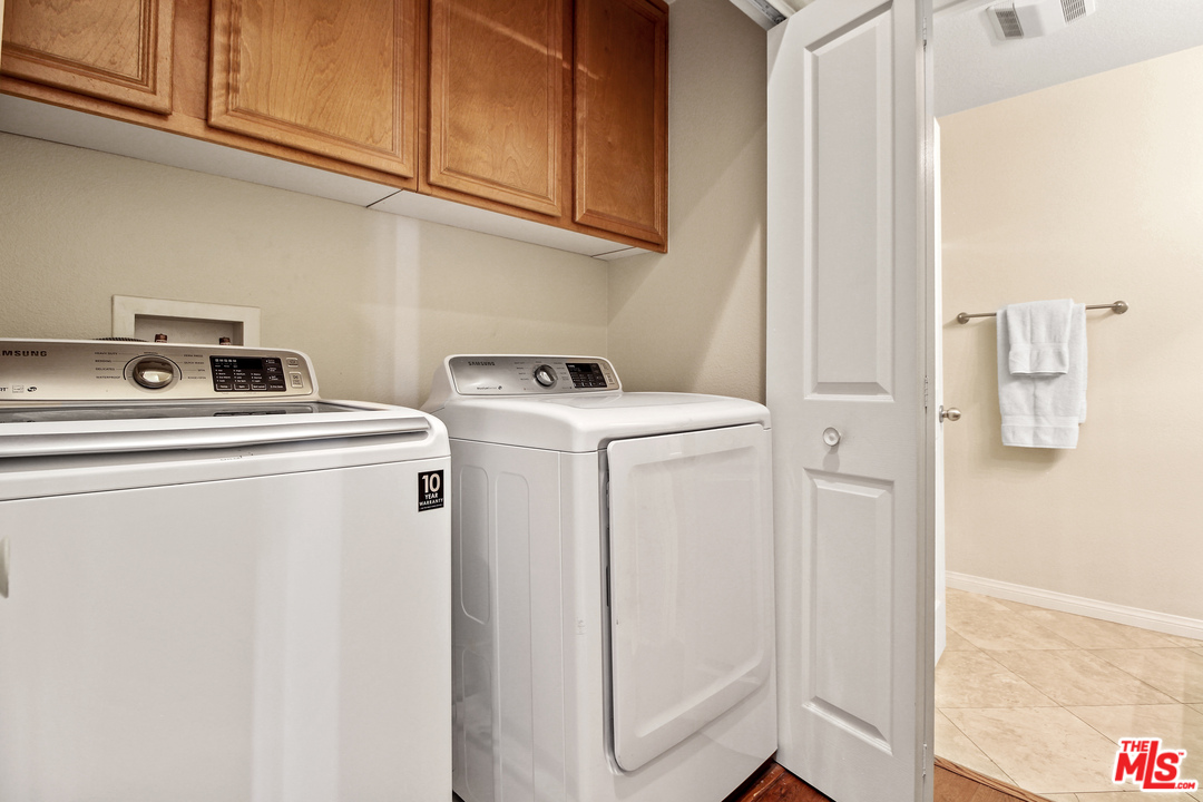 4153 Paredo Way, Unit A Simi Valley, CA 93063 - Photo 27 of 33 a utility room with dryer and washer