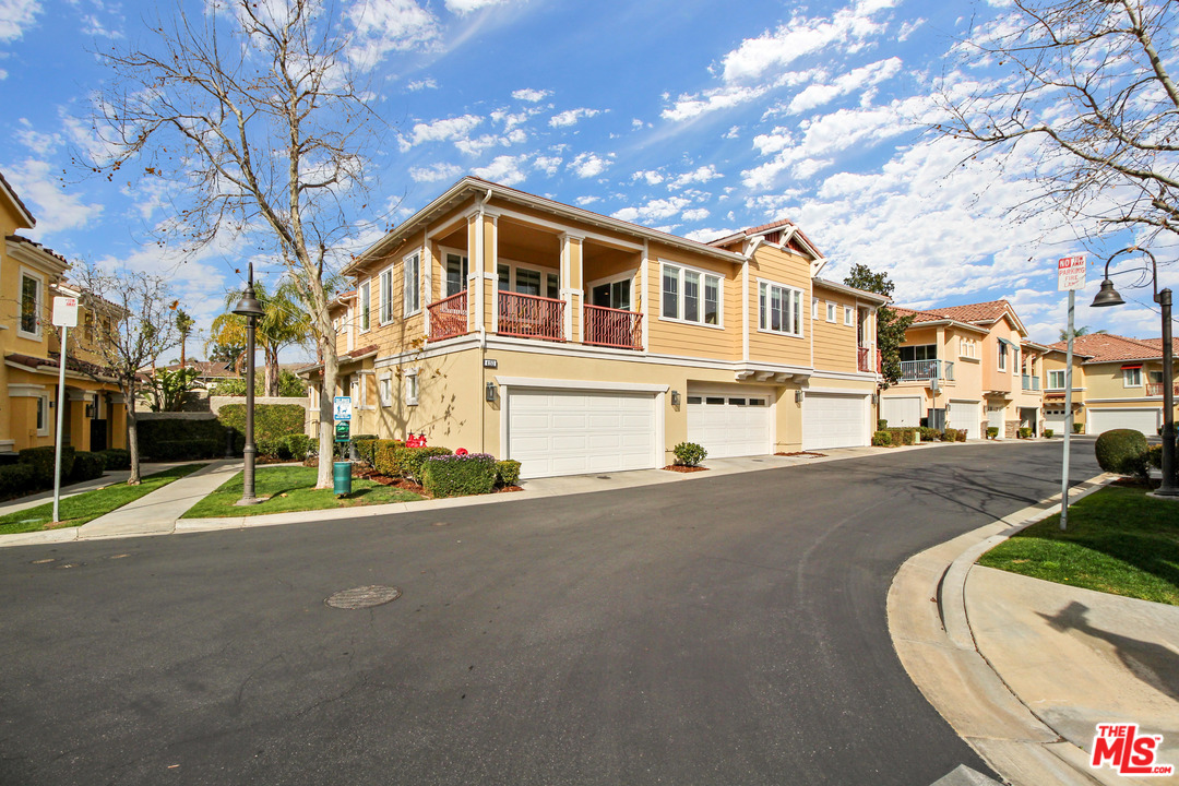 4153 Paredo Way, Unit A Simi Valley, CA 93063 - Photo 30 of 33 a view of a street with houses