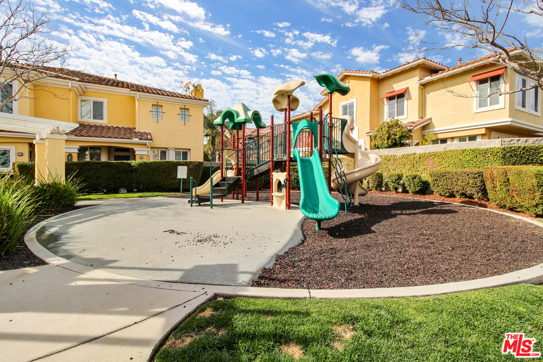 4153 Paredo Way, Unit A Simi Valley, CA 93063 - Photo 32 of 33 a view of a house with a backyard