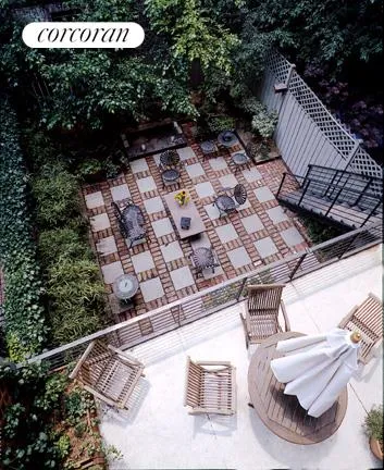 a living room with furniture a window and a fireplace