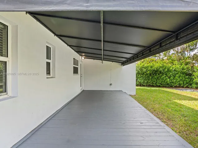 a view of a backyard of a house