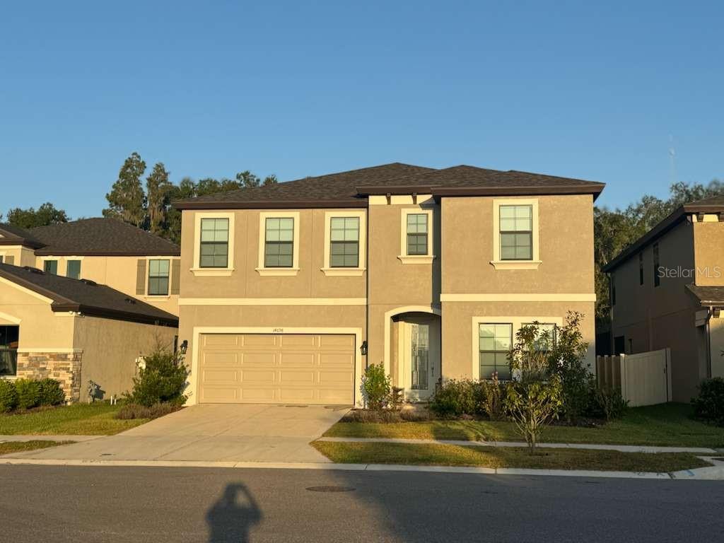 14698 Horse Trot Road Lithia, FL 33547 - Photo 3 of 5 a front view of a house with a yard