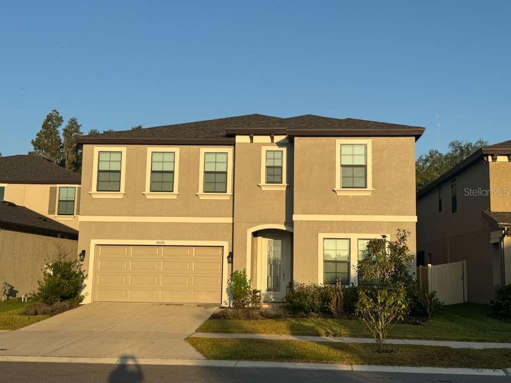 14698 Horse Trot Road Lithia, FL 33547 - Photo 4 of 5 a front view of a house with a yard