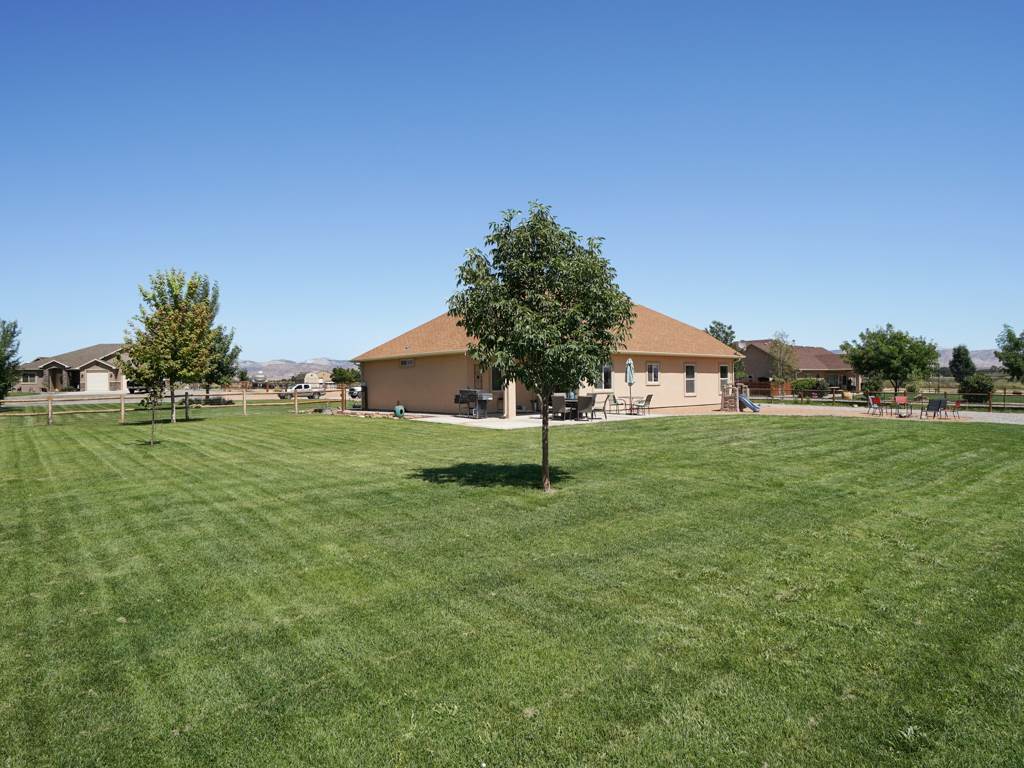 1855 Golden Ranch Road Fruita, CO 81521 - Photo 20 of 24 a view of a house with a yard