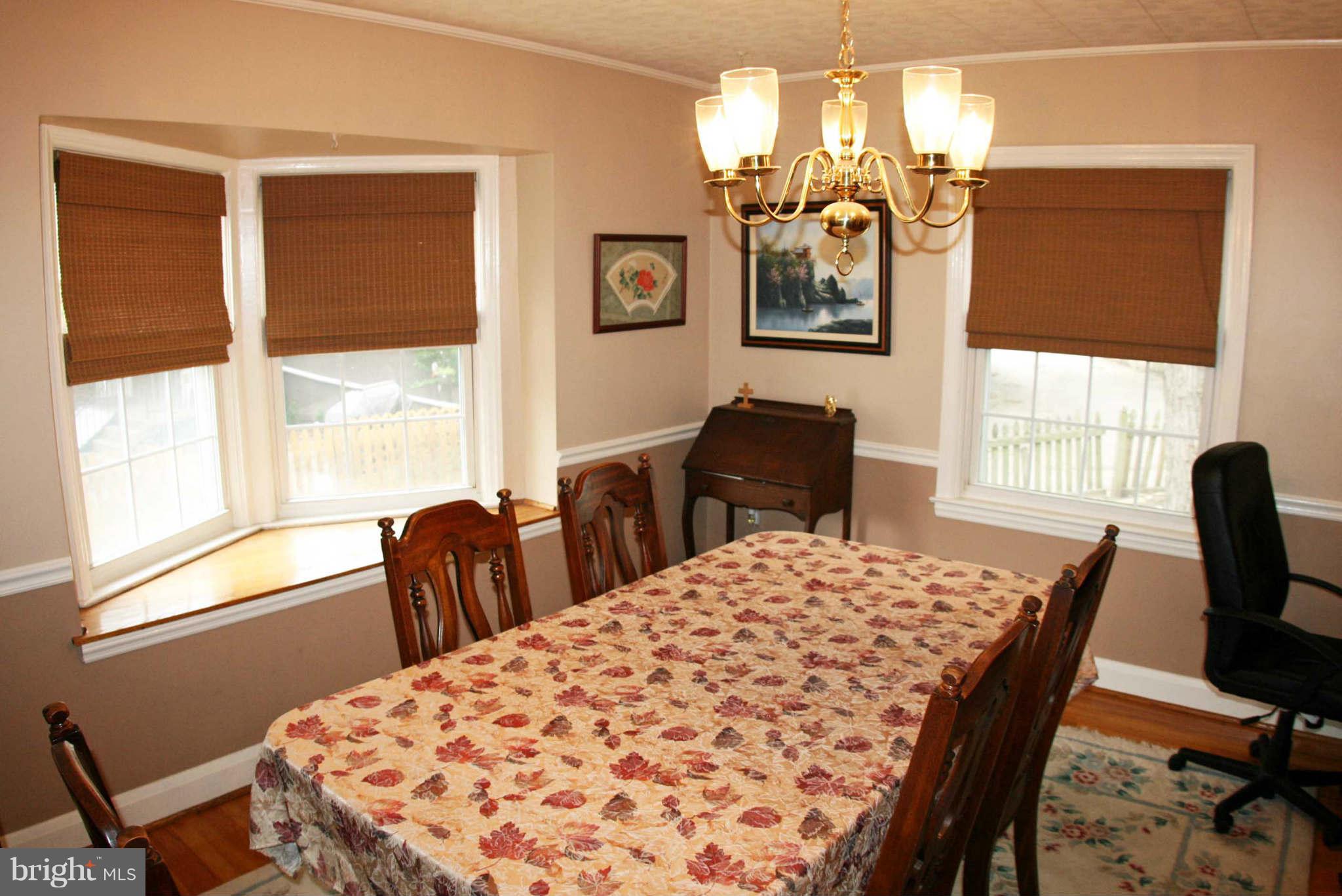 1835 Glen Ridge Road Baltimore, MD 21286 - Photo 11 of 30 a view of a dining room with furniture window and outside view