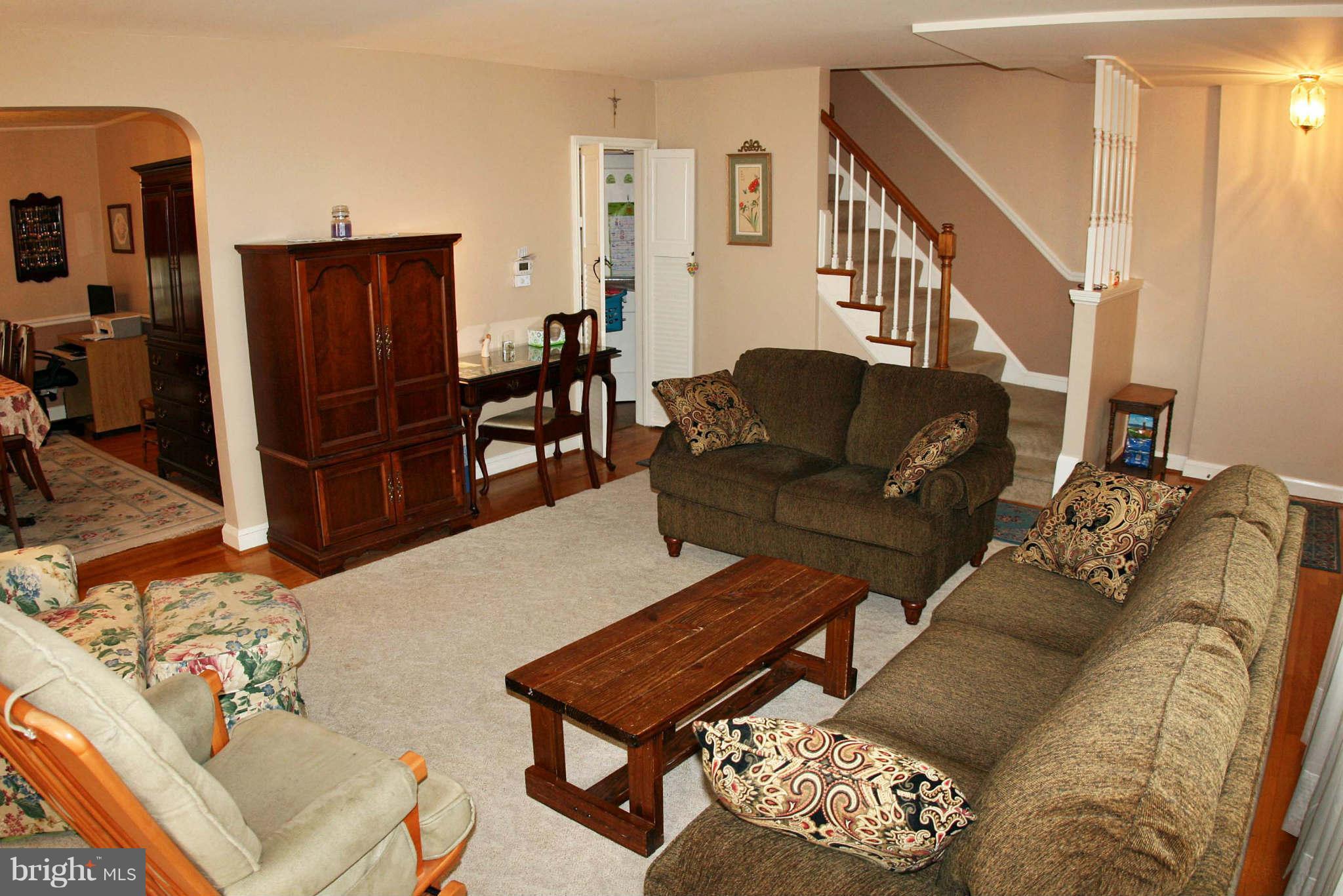 1835 Glen Ridge Road Baltimore, MD 21286 - Photo 3 of 30 a living room with furniture and wooden floor