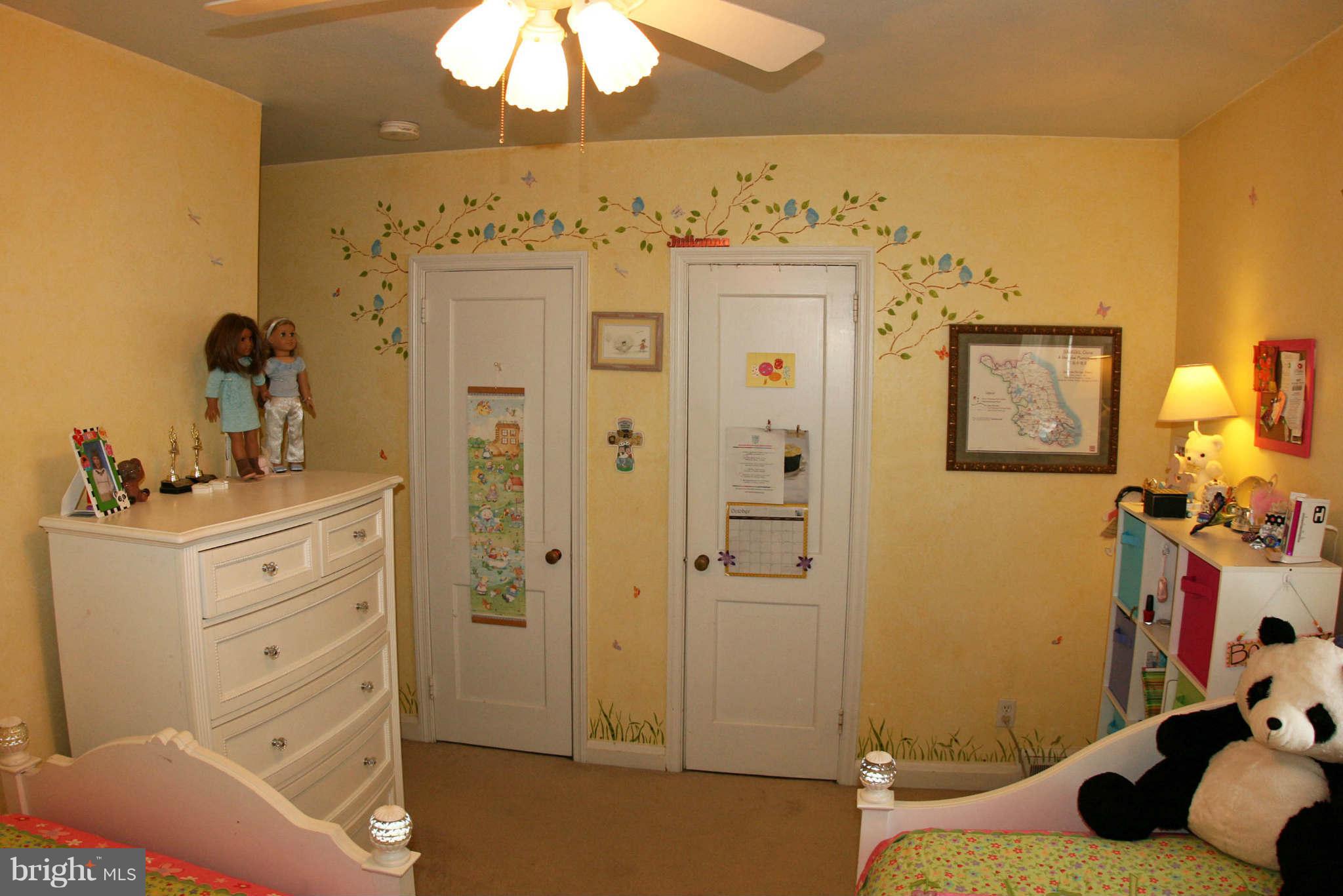 1835 Glen Ridge Road Baltimore, MD 21286 - Photo 23 of 30 a bedroom with a bed and a dresser