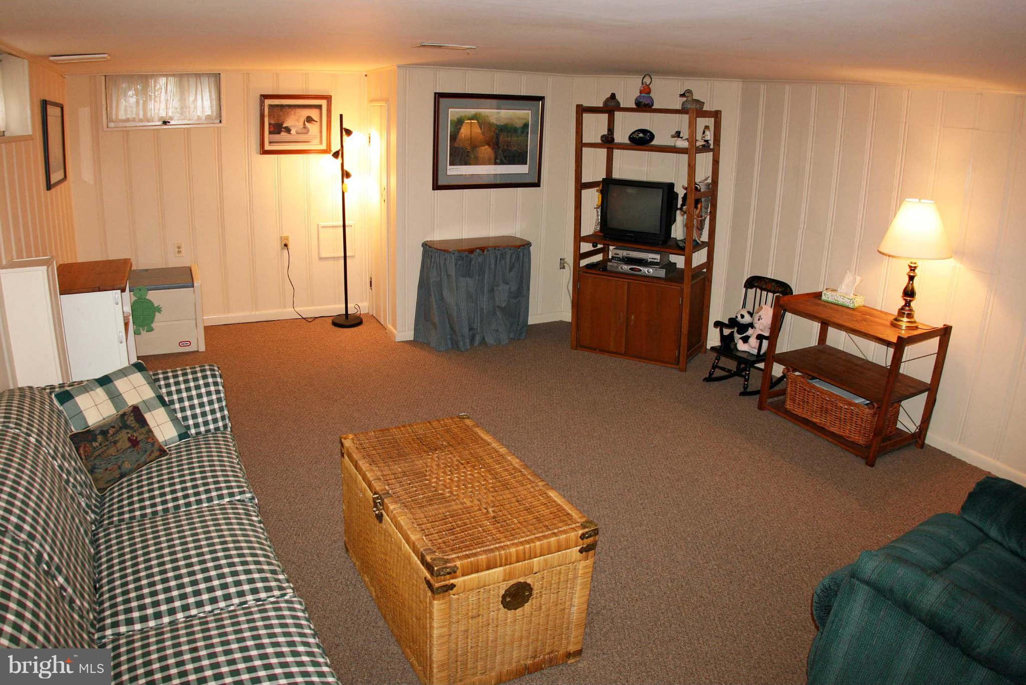 1835 Glen Ridge Road Baltimore, MD 21286 - Photo 25 of 30 a bedroom with furniture and a flat screen tv