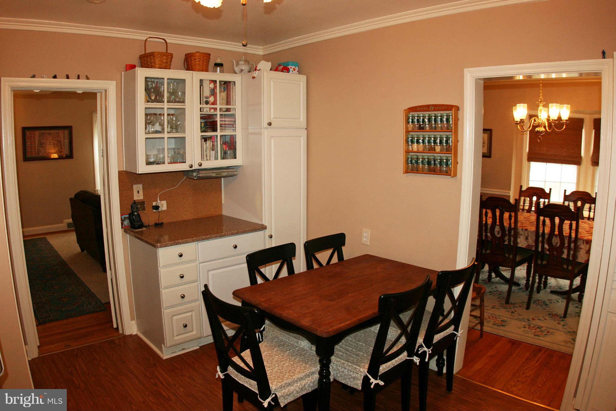 1835 Glen Ridge Road Baltimore, MD 21286 - Photo 8 of 30 a view of a dining room with furniture and wooden floor