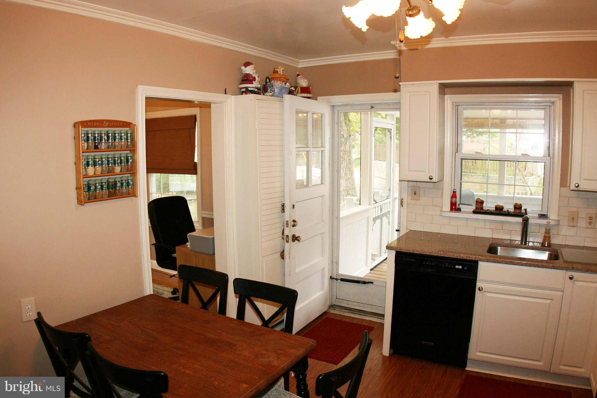 1835 Glen Ridge Road Baltimore, MD 21286 - Photo 10 of 30 a view of a dining room with furniture and window