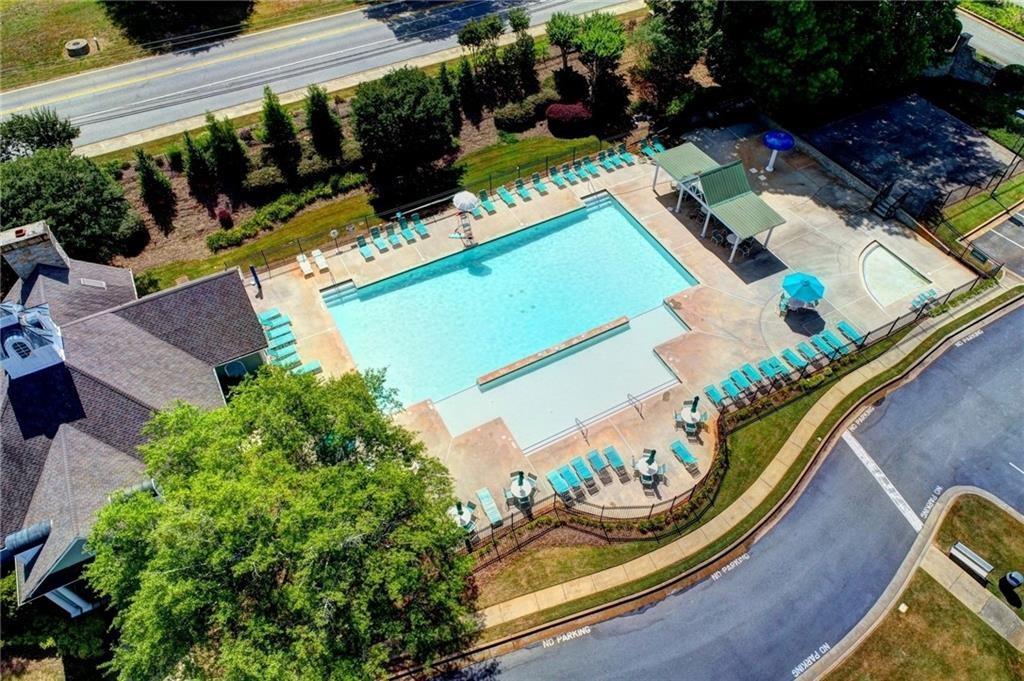 1595 Chadberry Way Lawrenceville, GA 30043 - Photo 27 of 47 an aerial view of a house a yard and outdoor seating