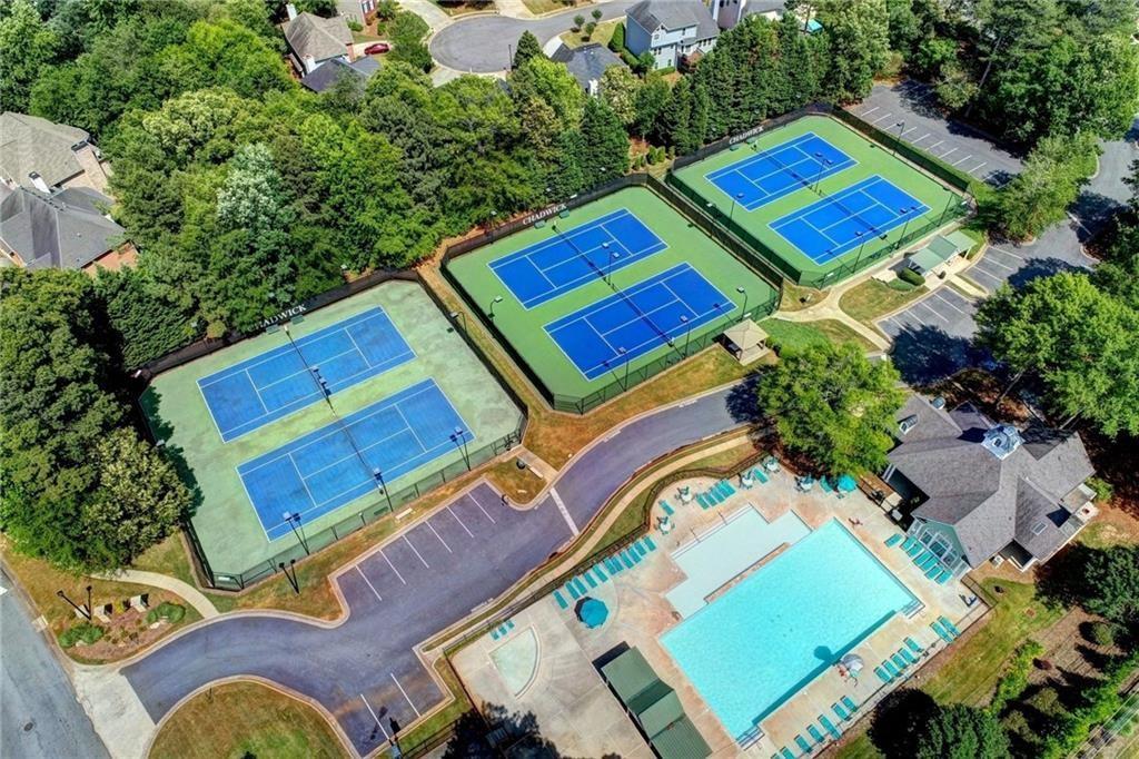1595 Chadberry Way Lawrenceville, GA 30043 - Photo 30 of 47 an aerial view of a tennis ground and a yard