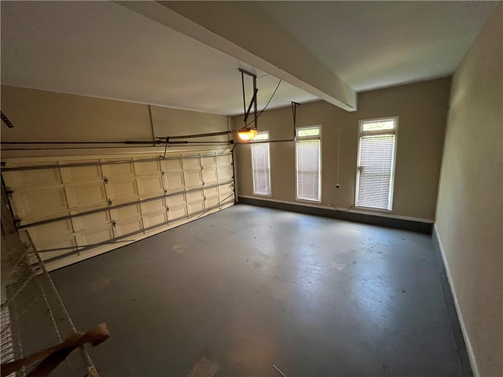 1595 Chadberry Way Lawrenceville, GA 30043 - Photo 35 of 47 a view of a room with wooden floor and window