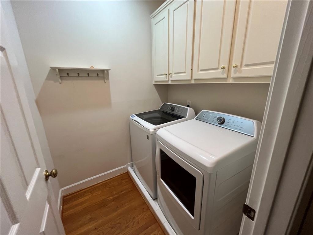 1595 Chadberry Way Lawrenceville, GA 30043 - Photo 36 of 47 a utility room with dryer and washer