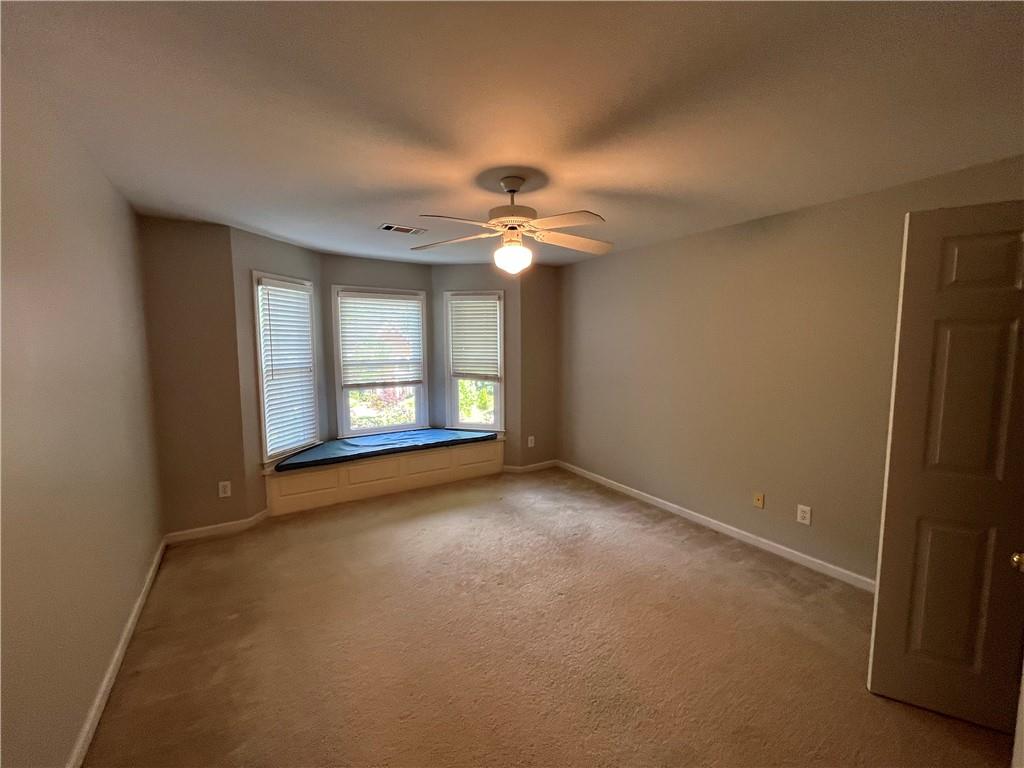 1595 Chadberry Way Lawrenceville, GA 30043 - Photo 41 of 47 a view of an empty room with a window