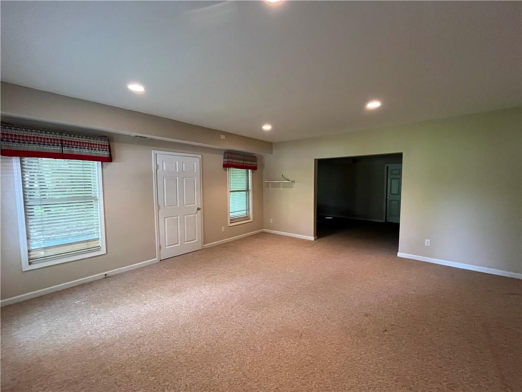 1595 Chadberry Way Lawrenceville, GA 30043 - Photo 44 of 47 a view of an empty room with a window
