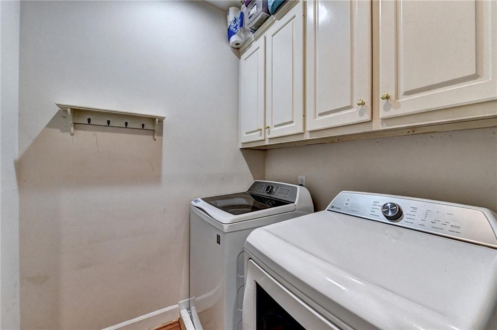 1595 Chadberry Way Lawrenceville, GA 30043 - Photo 10 of 47 a utility room with dryer and washer
