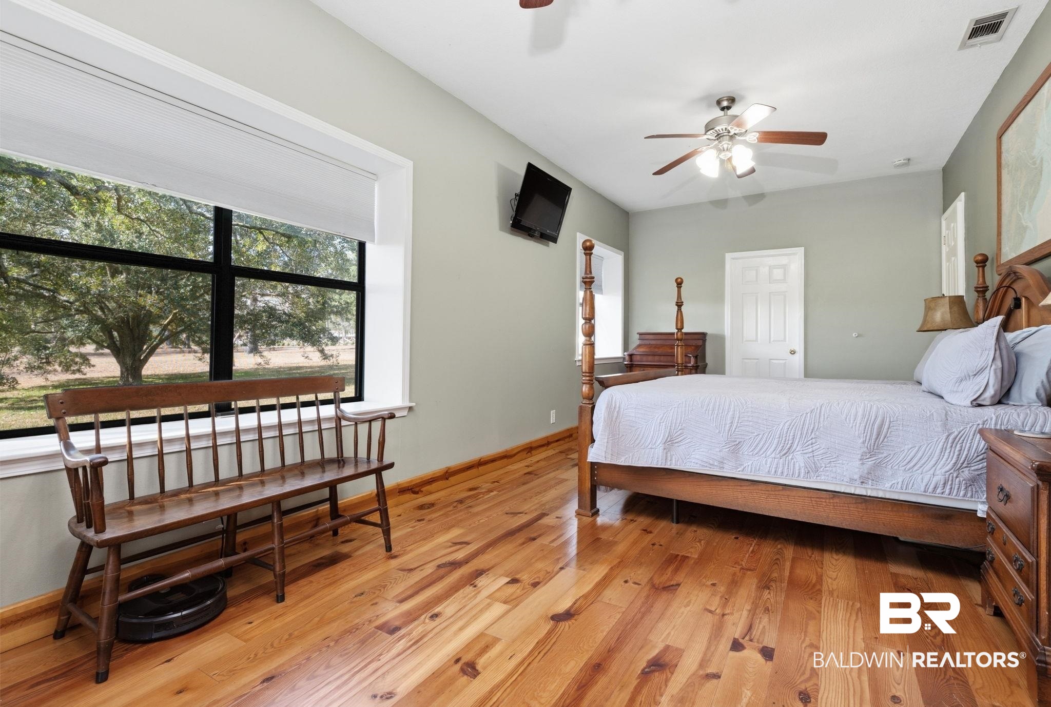 15025 Bellingrath Road Coden, AL 36523 - Photo 52 of 79 Bedroom featuring light wood-type flooring and a ceiling fan