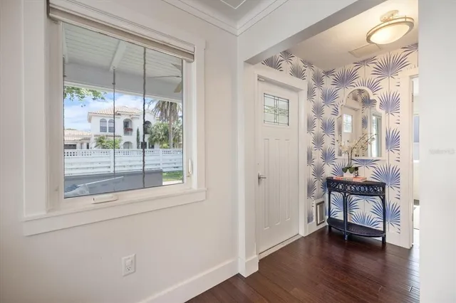 a bathroom with a granite countertop sink double and mirror