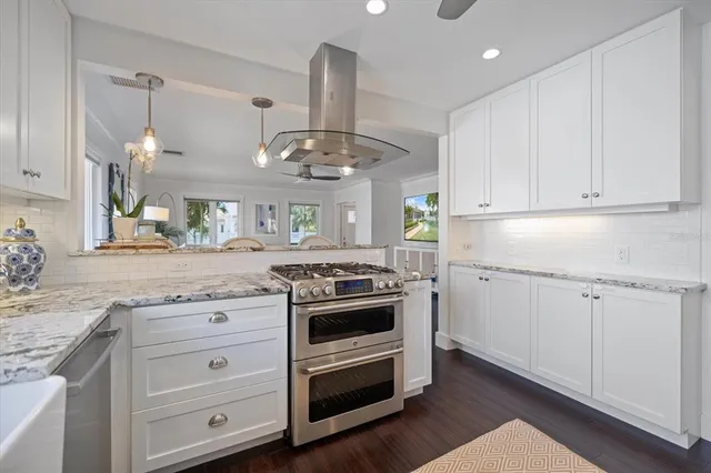 a bathroom with a sink a vanity and a toilet