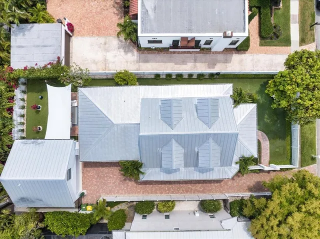 a kitchen with granite countertop a stove and a sink
