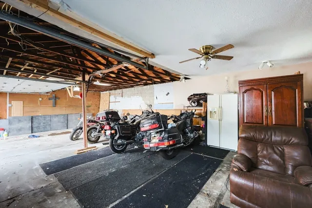 a view of a garage with furniture