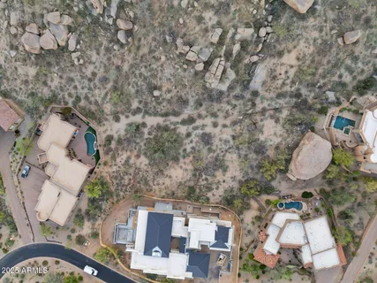 a view of a city with mountains in the background