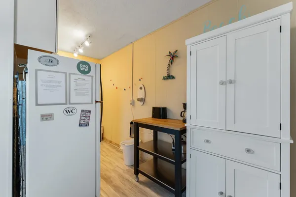 a bedroom with a bed and a cabinets