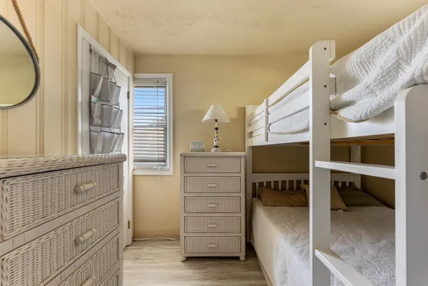 a bedroom with a bed and a cabinets