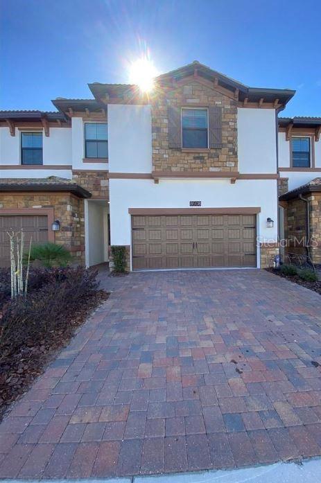 8508 Wingfoot Road Davenport, FL 33896 - Photo 1 of 1 a view of house with outdoor space and a parking area