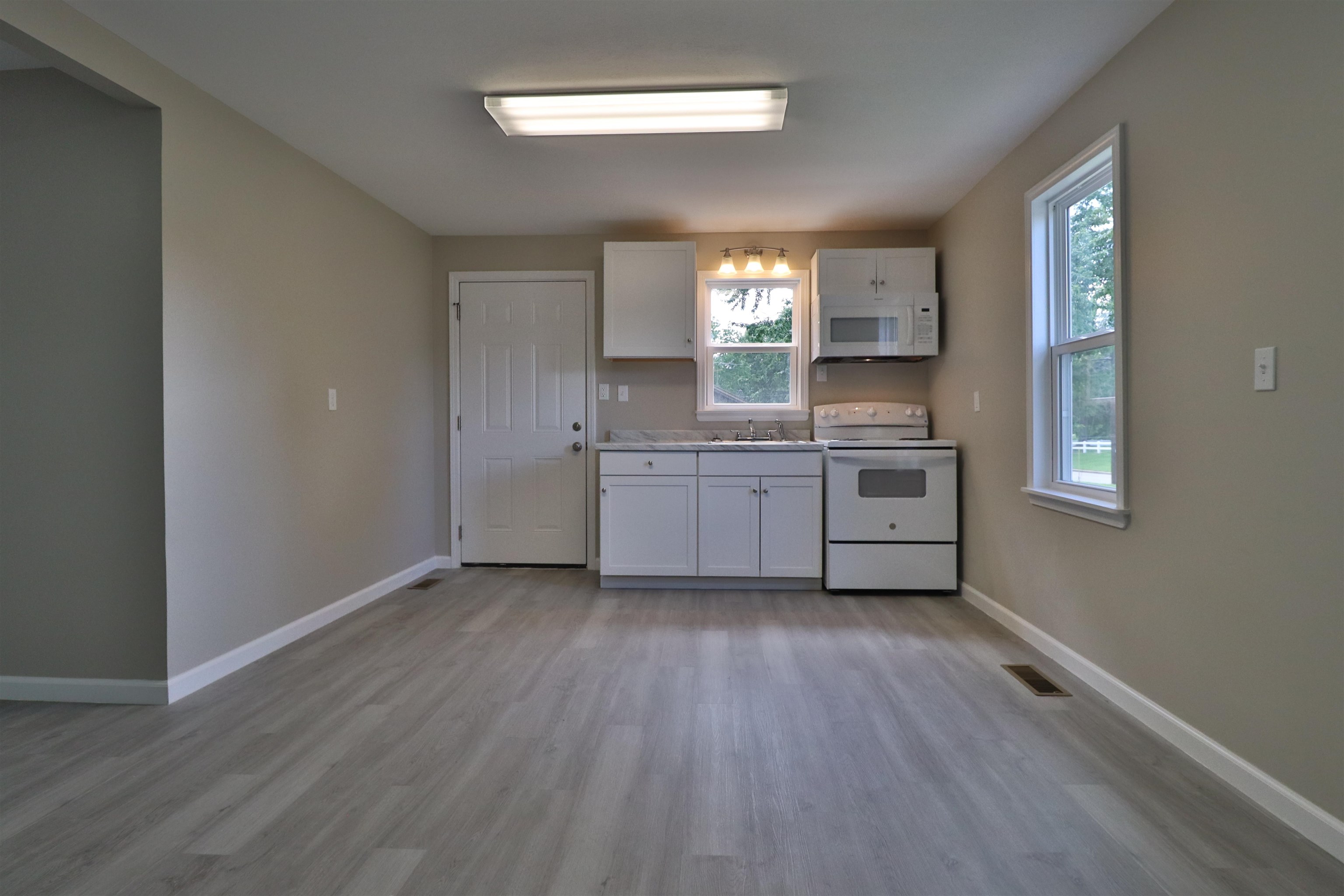 224 Kellar Avenue Ripley, TN 38063 - Photo 7 of 30 a view with a sink and a window in a room
