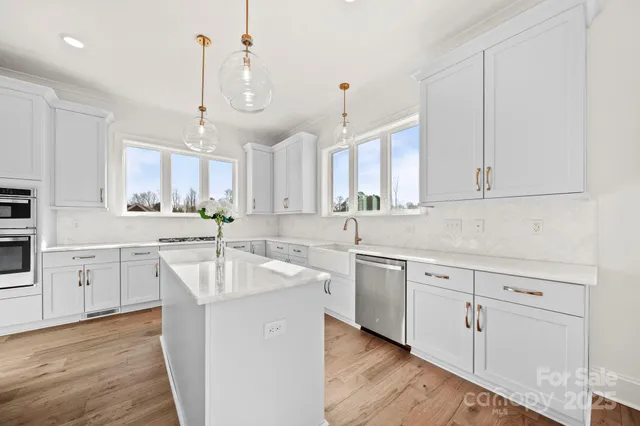 a view of a hallway with seating area