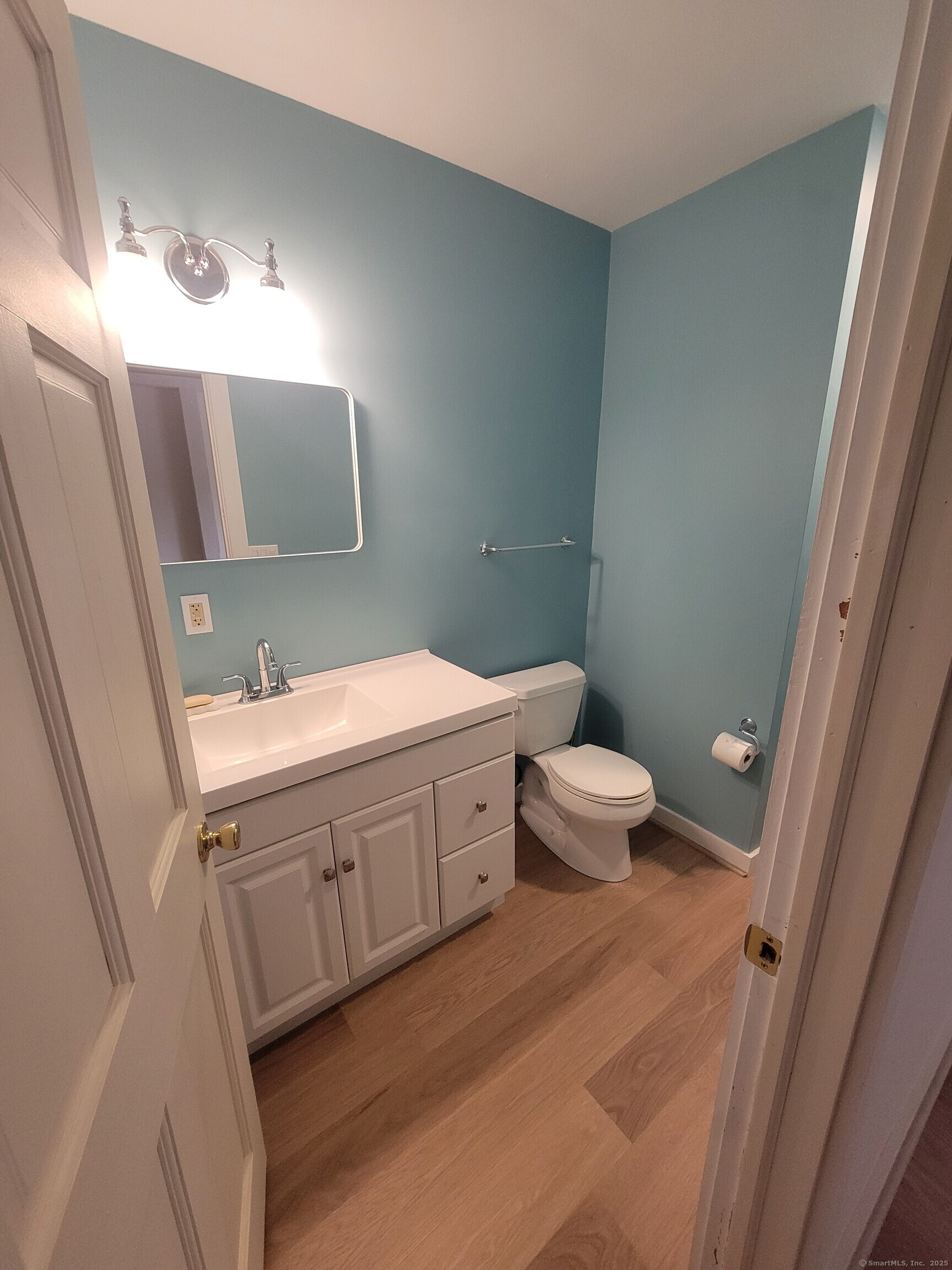 270 Cherry Brook Road, Unit 3 Canton, CT 06019 - Photo 12 of 18 a bathroom with a sink a toilet and mirror