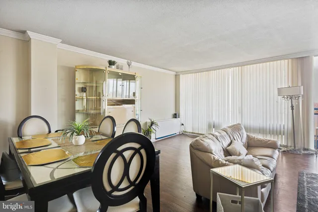 a spacious bedroom with a bed and a couch