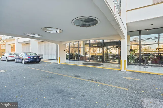 a view of living room filled with furniture and rug