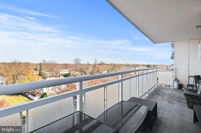 a bathroom with a granite countertop sink toilet a mirror and shower