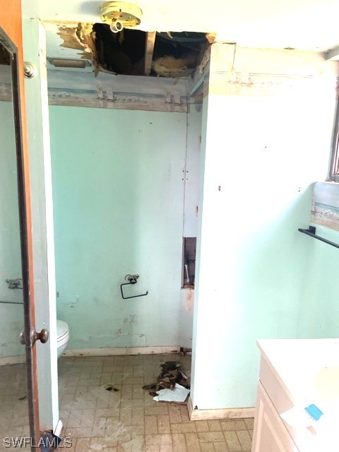 6670 Sun Rise Lane Bokeelia, FL 33922 - Photo 9 of 13 a bathroom with a sink and a toilet