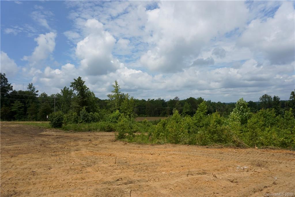 5-ac Boheler Road, Unit LOT 4 Clover, SC 29710 - Photo 5 of 9 a view of a field with a bench