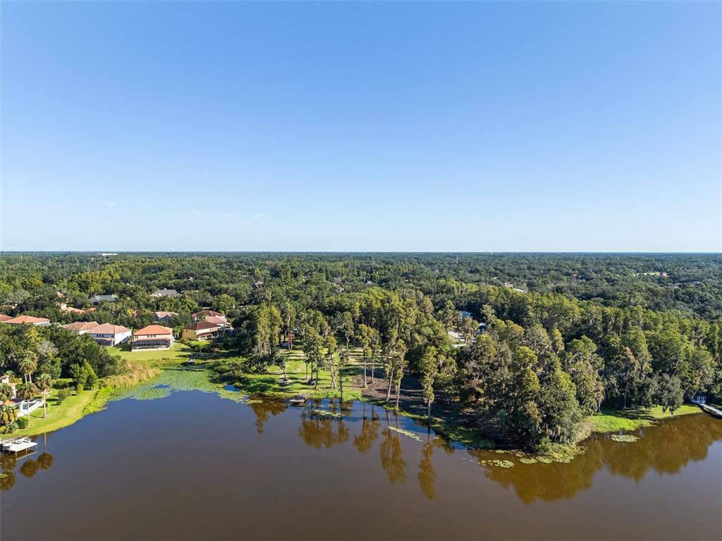 16619 Indian Mound Road Tampa, FL 33618 - Photo 2 of 26 a view of a lake with a city