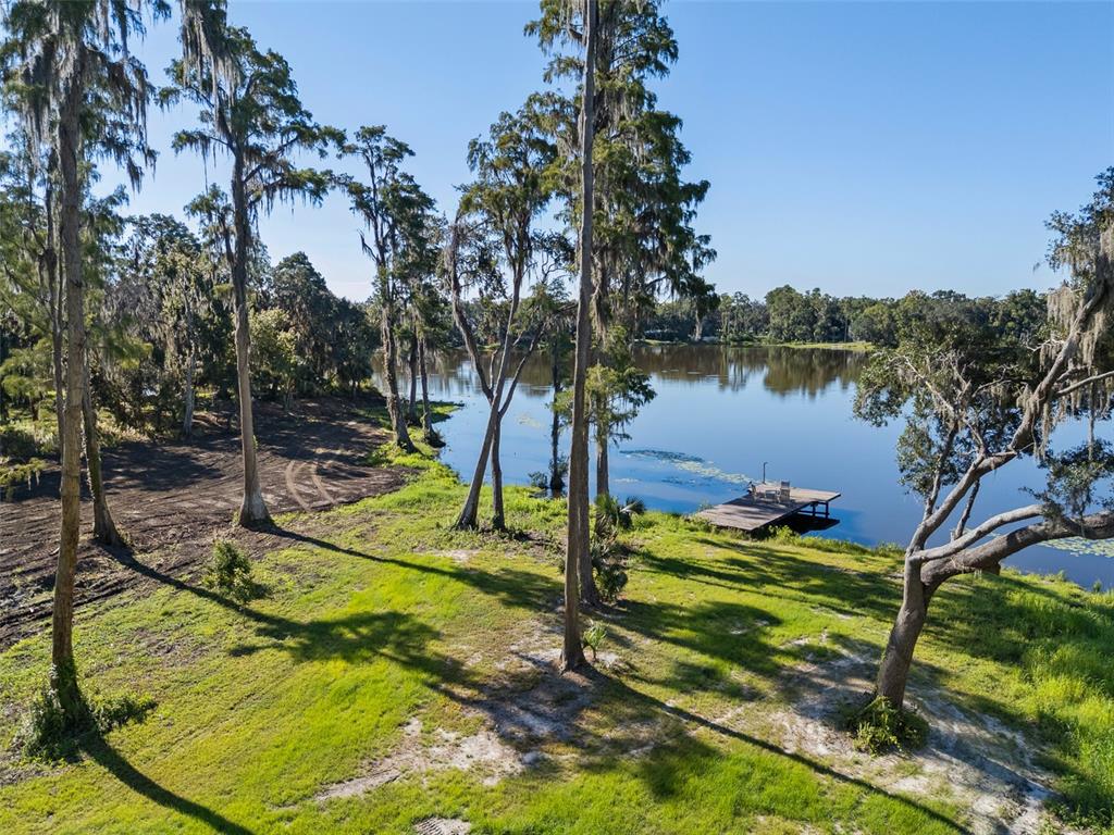 16619 Indian Mound Road Tampa, FL 33618 - Photo 5 of 26 a view of a lake with a yard