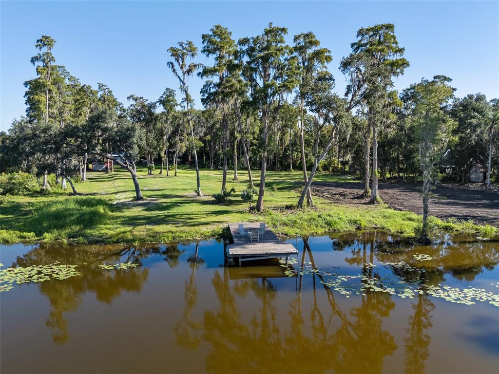 16619 Indian Mound Road Tampa, FL 33618 - Photo 6 of 26 a view of a lake with a park