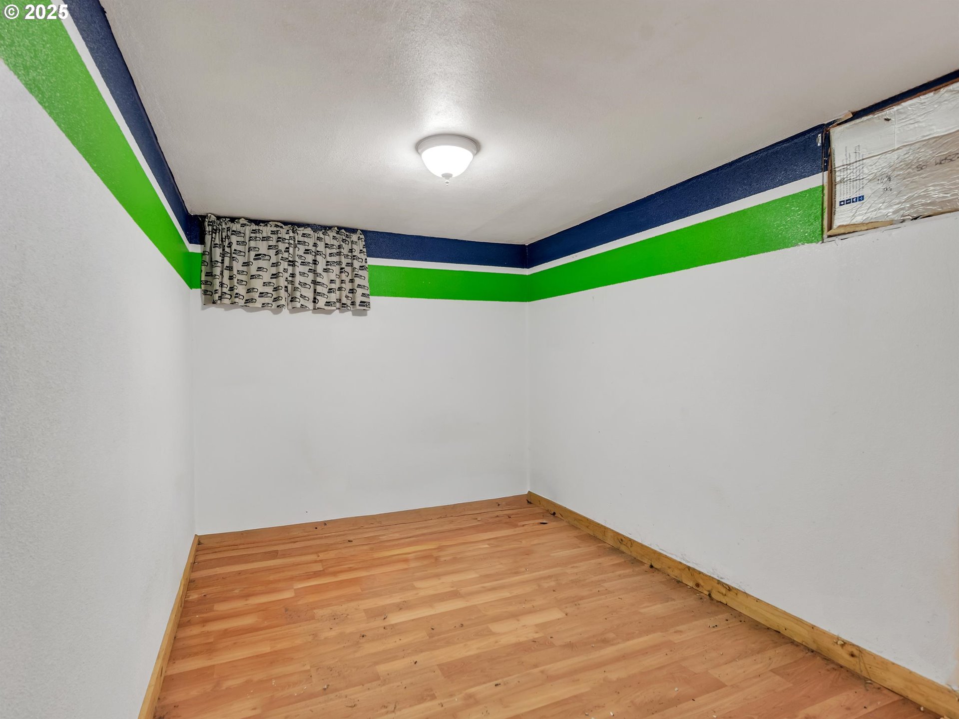 707 Northeast Carty Road Ridgefield, WA 98642 - Photo 21 of 31 a view of empty room with kitchen and green space