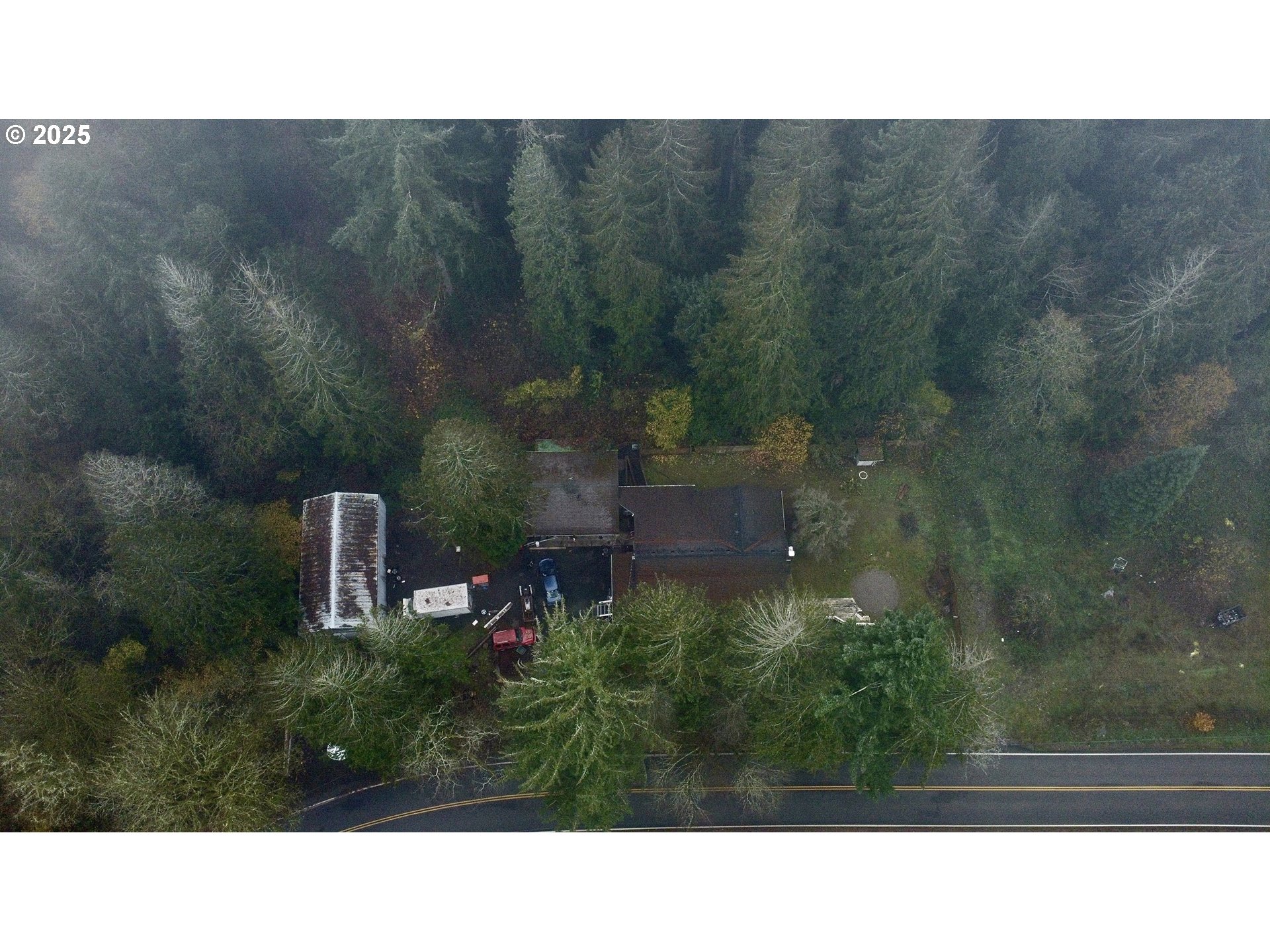 707 Northeast Carty Road Ridgefield, WA 98642 - Photo 27 of 31 a black and white photo of a house