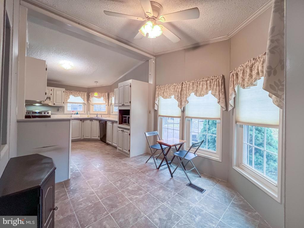 13 Clovedale Way Souderton, PA 18964 - Photo 15 of 33 a view of a kitchen with cabinets and stainless steel appliances